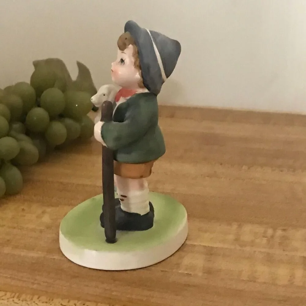 #1090 Flambro Porcelain Vintage boy with dog figurine